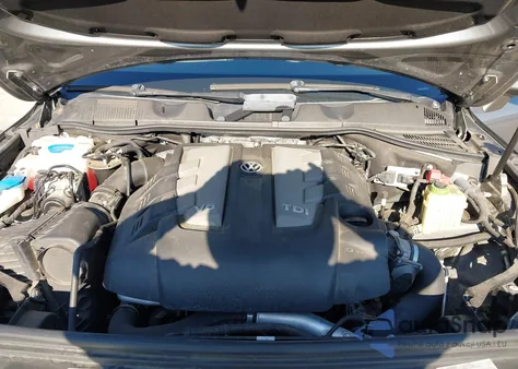 2014 Volkswagen Touareg Tdi Lux z USA, uszkodzony, nr VIN WVGEP9BP7ED013971